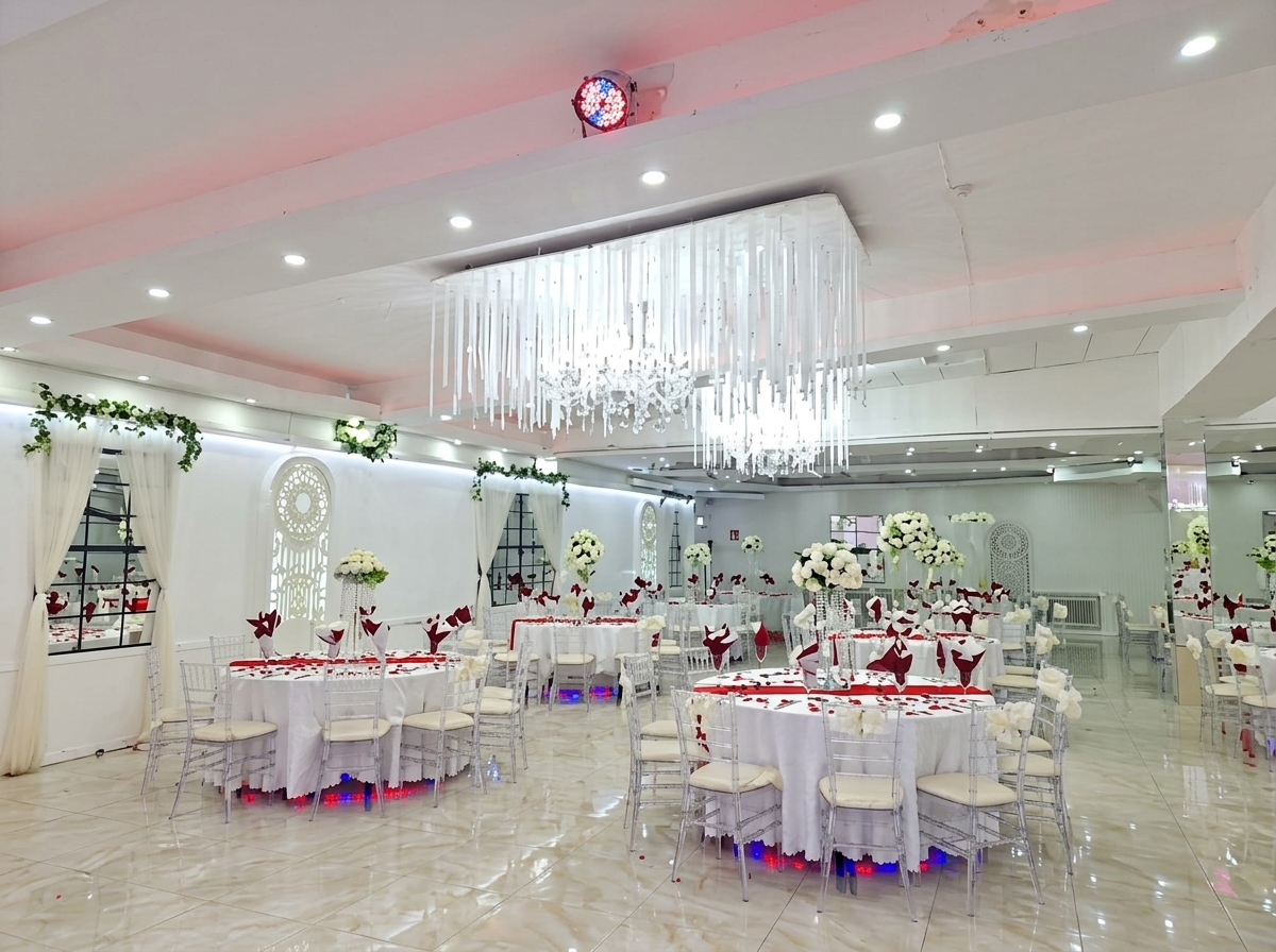 Elegant ballroom with crystal chandelier and red accents
